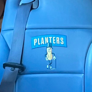 The Planters logo emblazoned on the blue leather seats